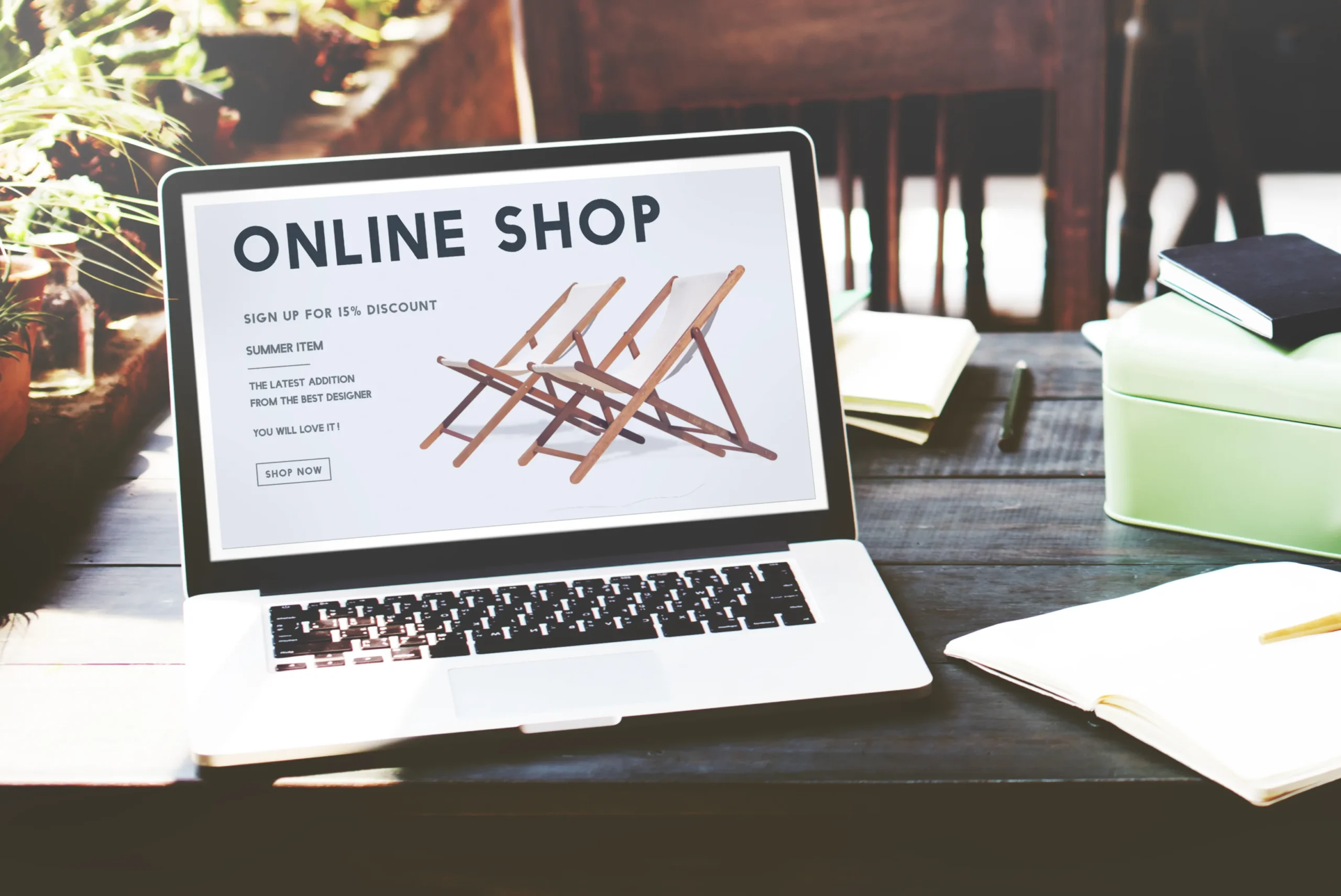 Online shopping and e-commerce concept with shopping bags and a laptop