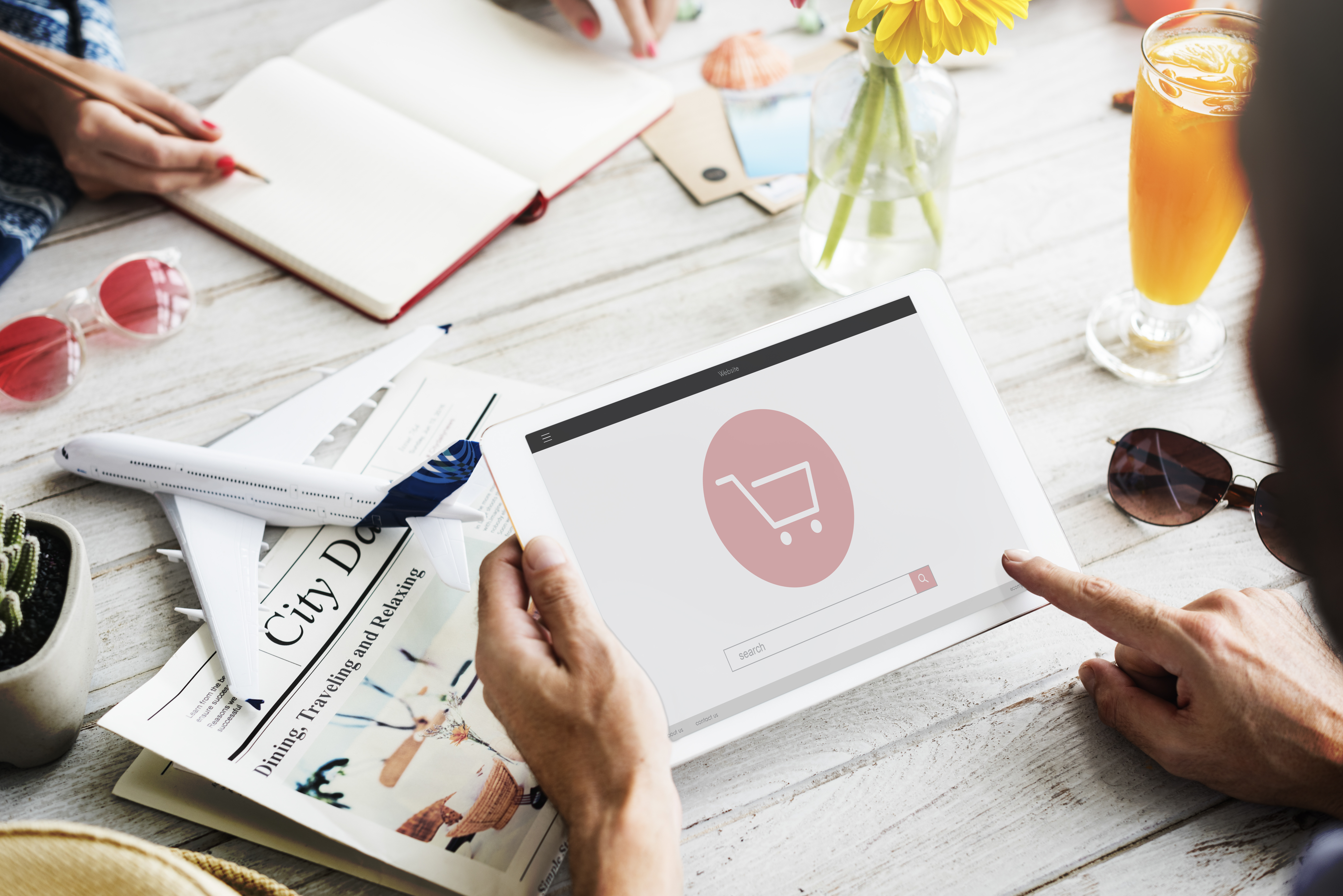 Ecommerce manager reviewing a Shopify product page on desktop and mobile to audit conversion elements