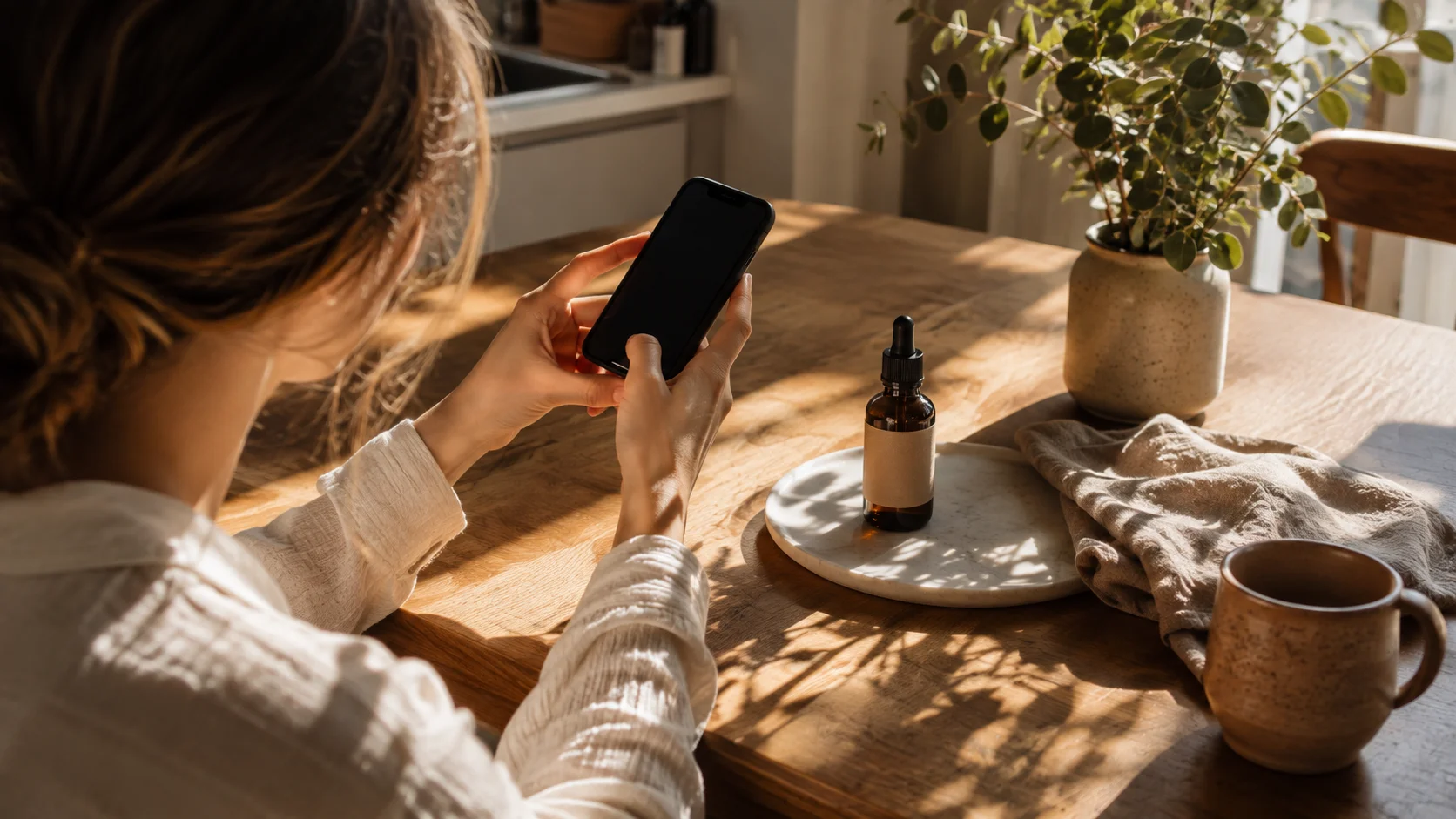 Ecommerce manager comparing product page conversion with and without a customer photo gallery on a laptop analytics dashboard